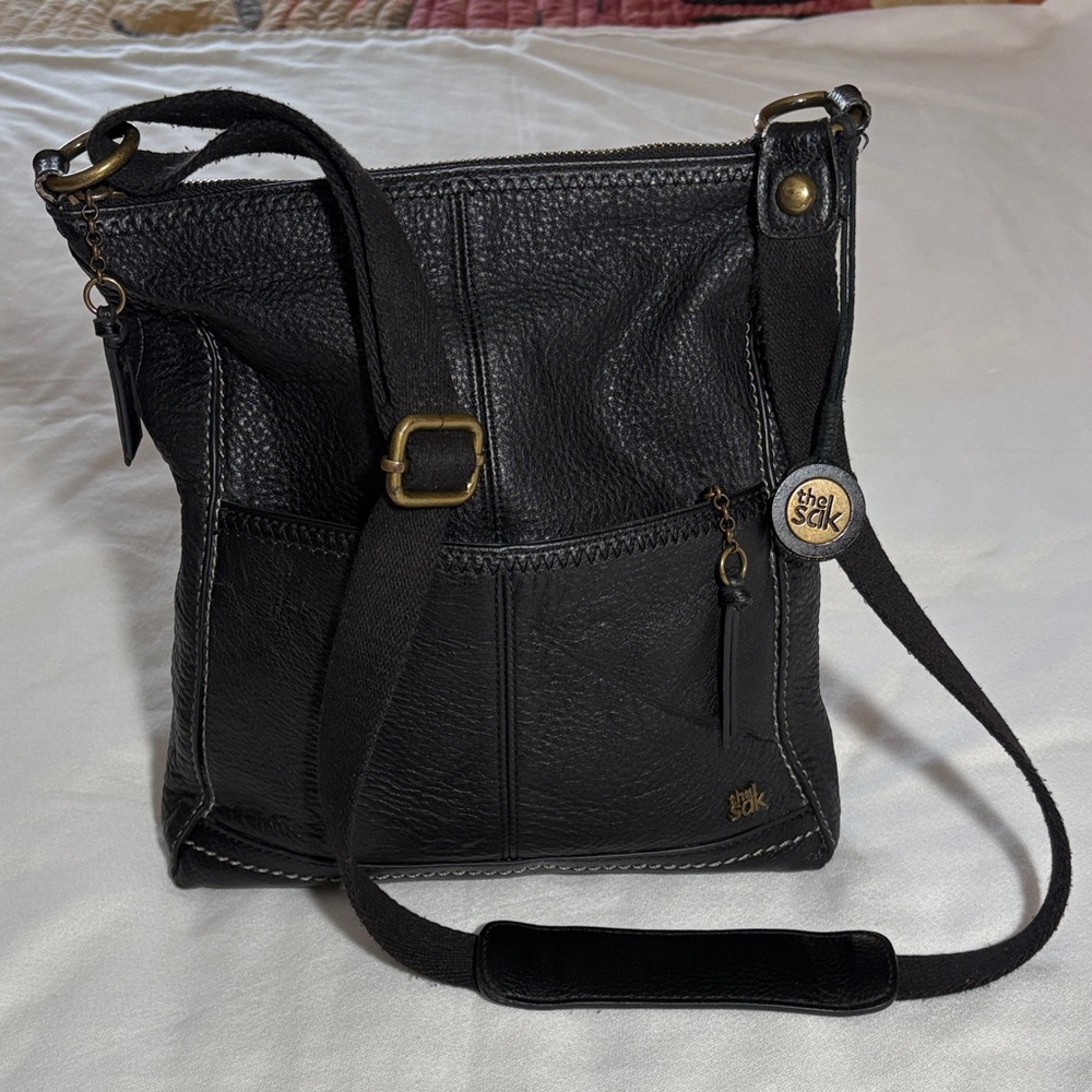The Sak Black Leather Crossbody Bag with Brass Accents